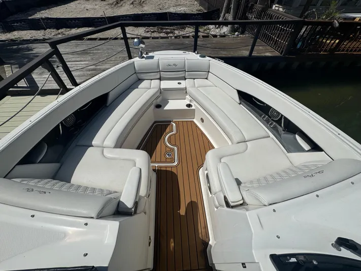  Yacht Photos Pics 2015 Sea Ray 350 SLX boat with spacious white seating and teak flooring.