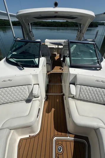  Yacht Photos Pics 2015 Sea Ray 350 SLX boat interior with white seating and wooden deck.