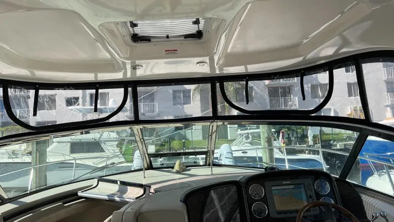 Lowest Price In Usa ! Yacht Photos Pics Interior view of 2008 Sea Ray 380 Sundancer yacht cockpit with navigation equipment.