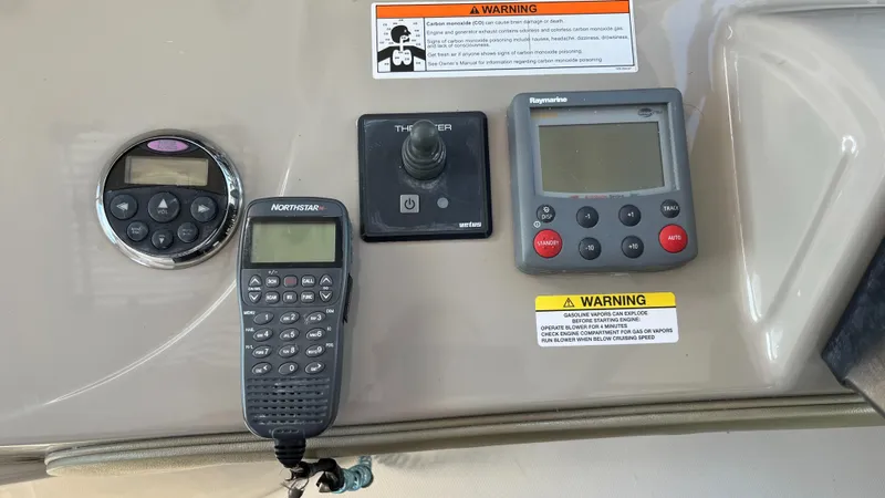 Lowest Price In Usa ! Yacht Photos Pics Control panel of a 2008 Sea Ray 380 Sundancer with navigation and communication devices.