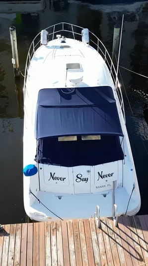 Lowest Price In Usa ! Yacht Photos Pics Sea Ray 380 Sundancer 2008 docked, featuring "Never Say Never" on the stern.