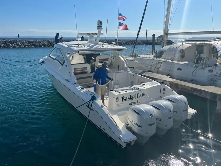  Yacht Photos Pics 2020 Pursuit DC 365 Dual Console boat docked with triple Yamaha engines.