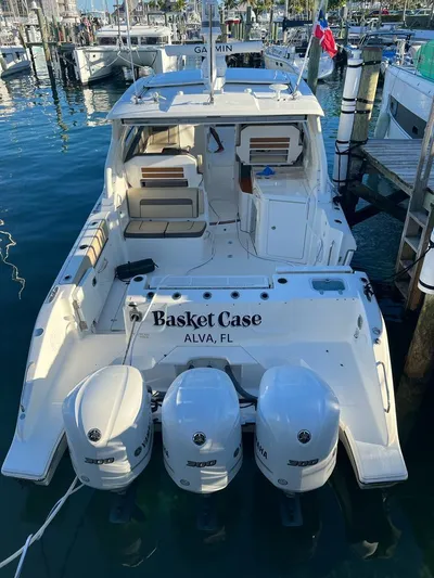  Yacht Photos Pics 2020 Pursuit DC 365 Dual Console boat docked with triple engines, named "Basket Case."