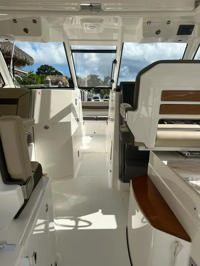  Yacht Photos Pics 2020 Pursuit DC 365 Dual Console interior with sleek design and ample seating.