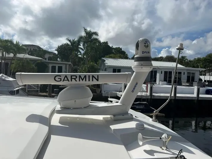  Yacht Photos Pics 2020 Pursuit DC 365 Dual Console with Garmin and FLIR equipment docked at marina.