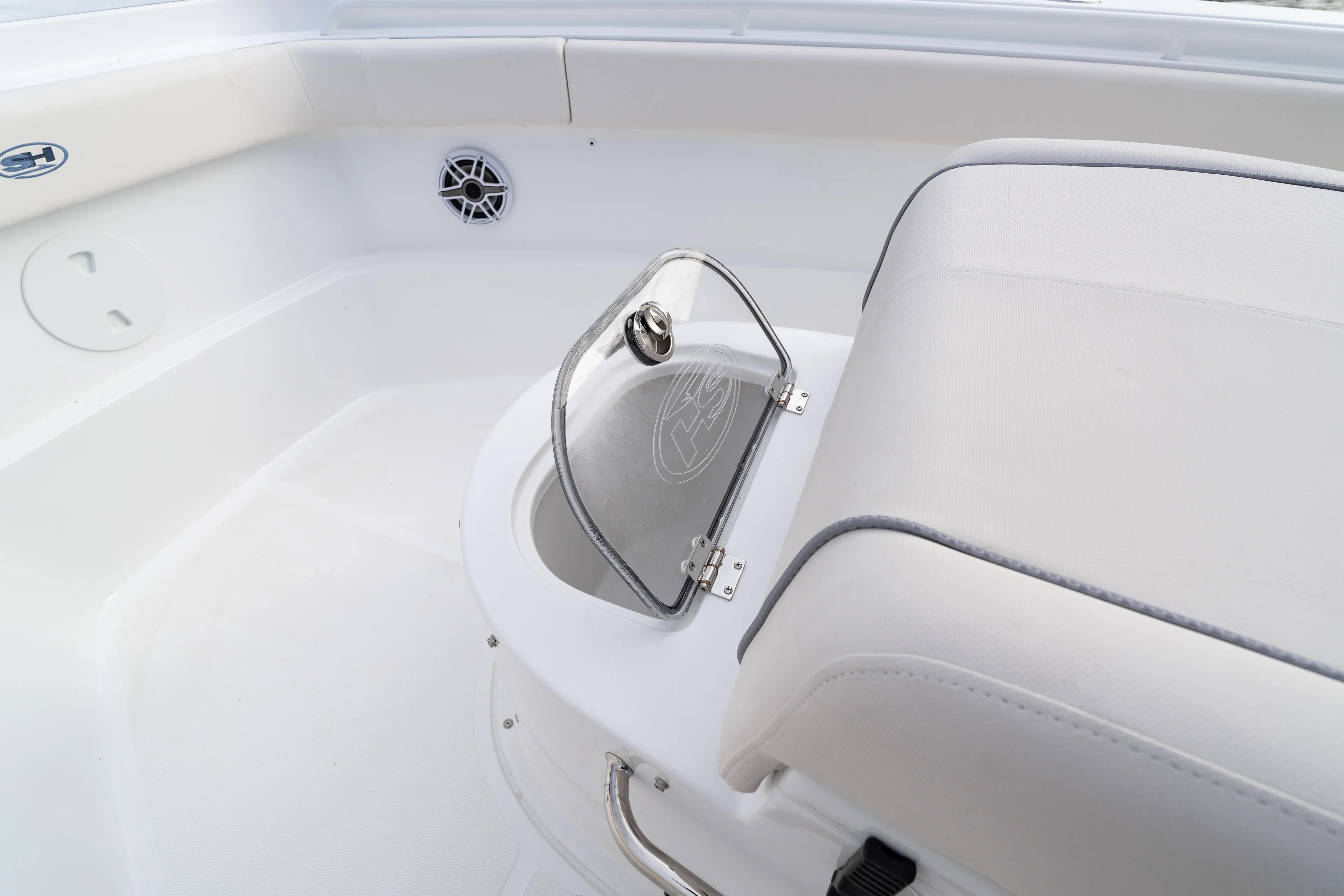  Yacht Photos Pics 2026 Sea Hunt Ultra 285 Coffin Box interior with seating and storage compartment.