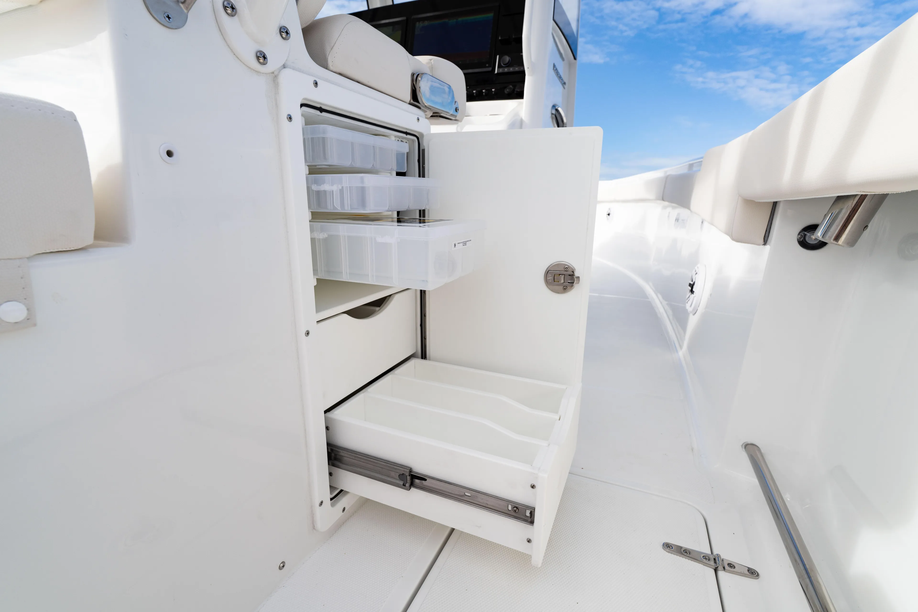  Yacht Photos Pics 2026 Sea Hunt Ultra 285 Coffin Box with open storage compartments on deck.