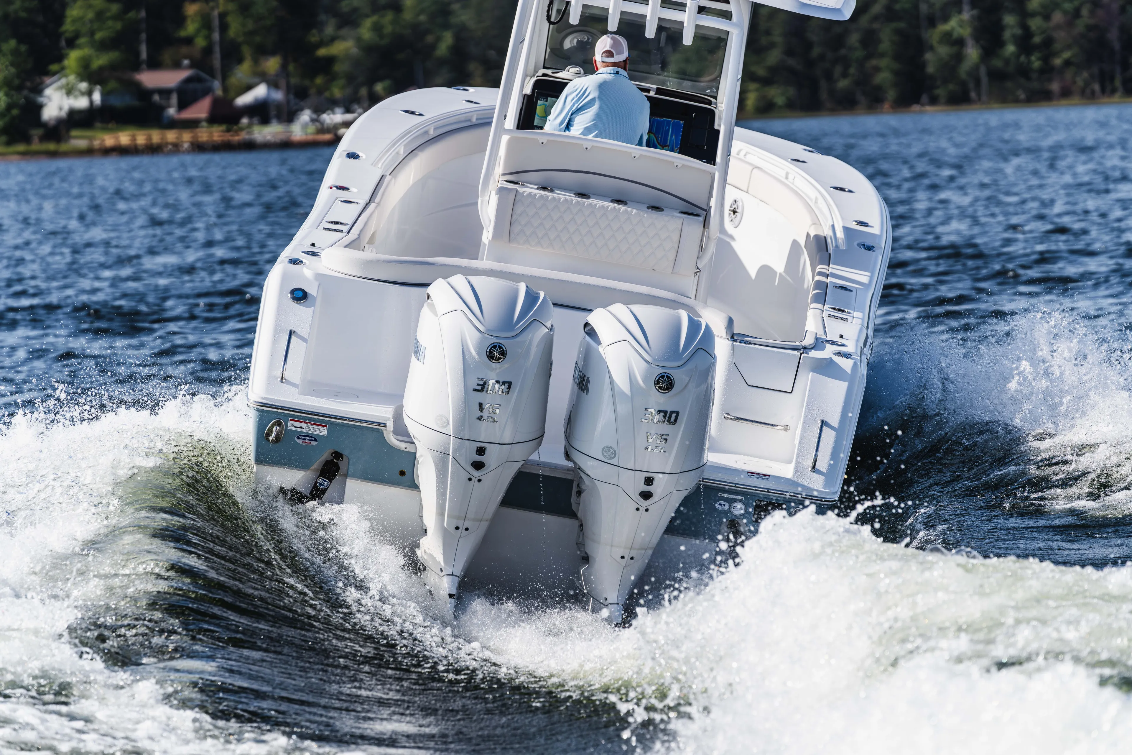  Yacht Photos Pics 2026 Sea Hunt Ultra 285 Coffin Box cruising on a lake with dual engines.