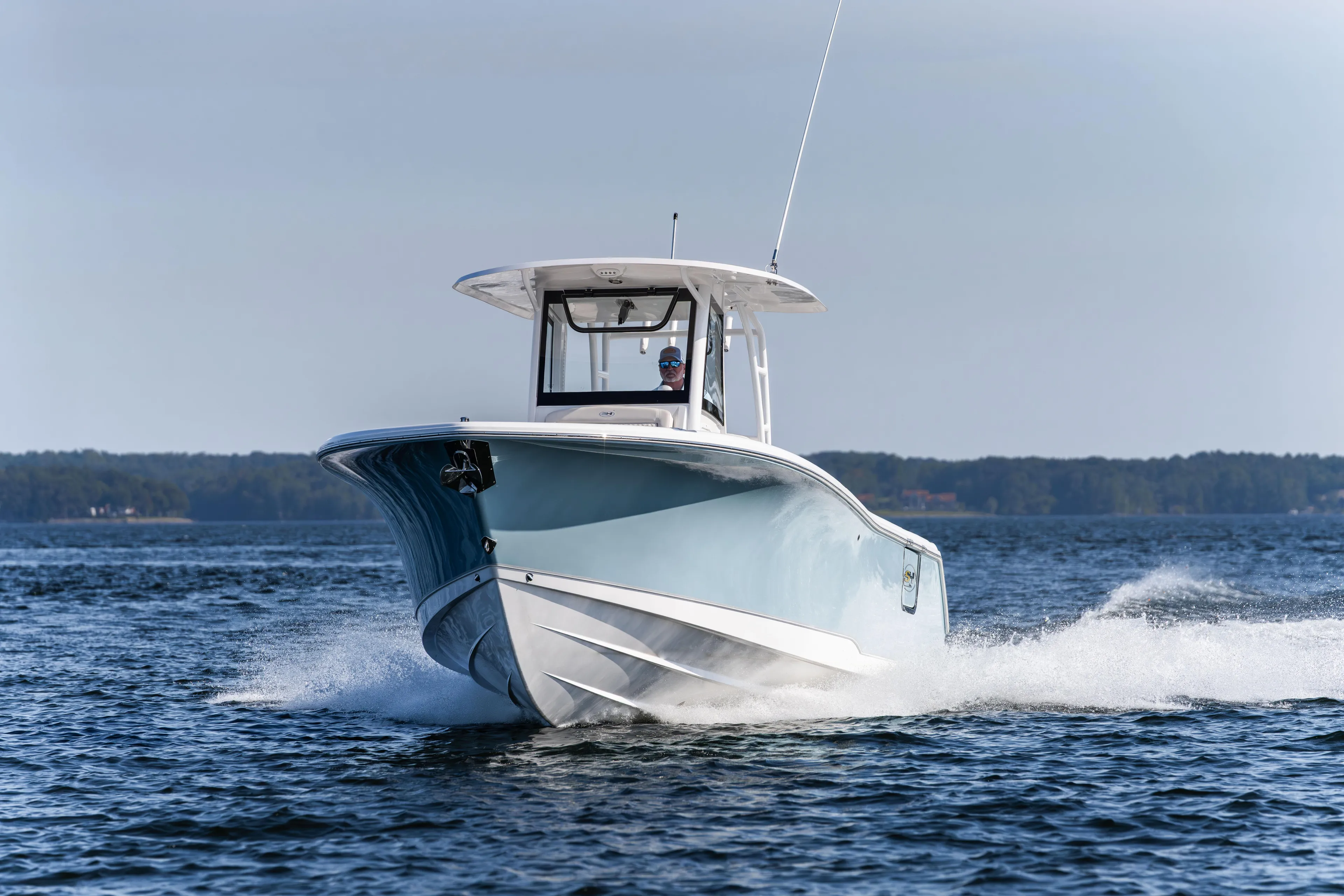  Yacht Photos Pics 2026 Sea Hunt Ultra 285 Coffin Box boat cruising on open water.