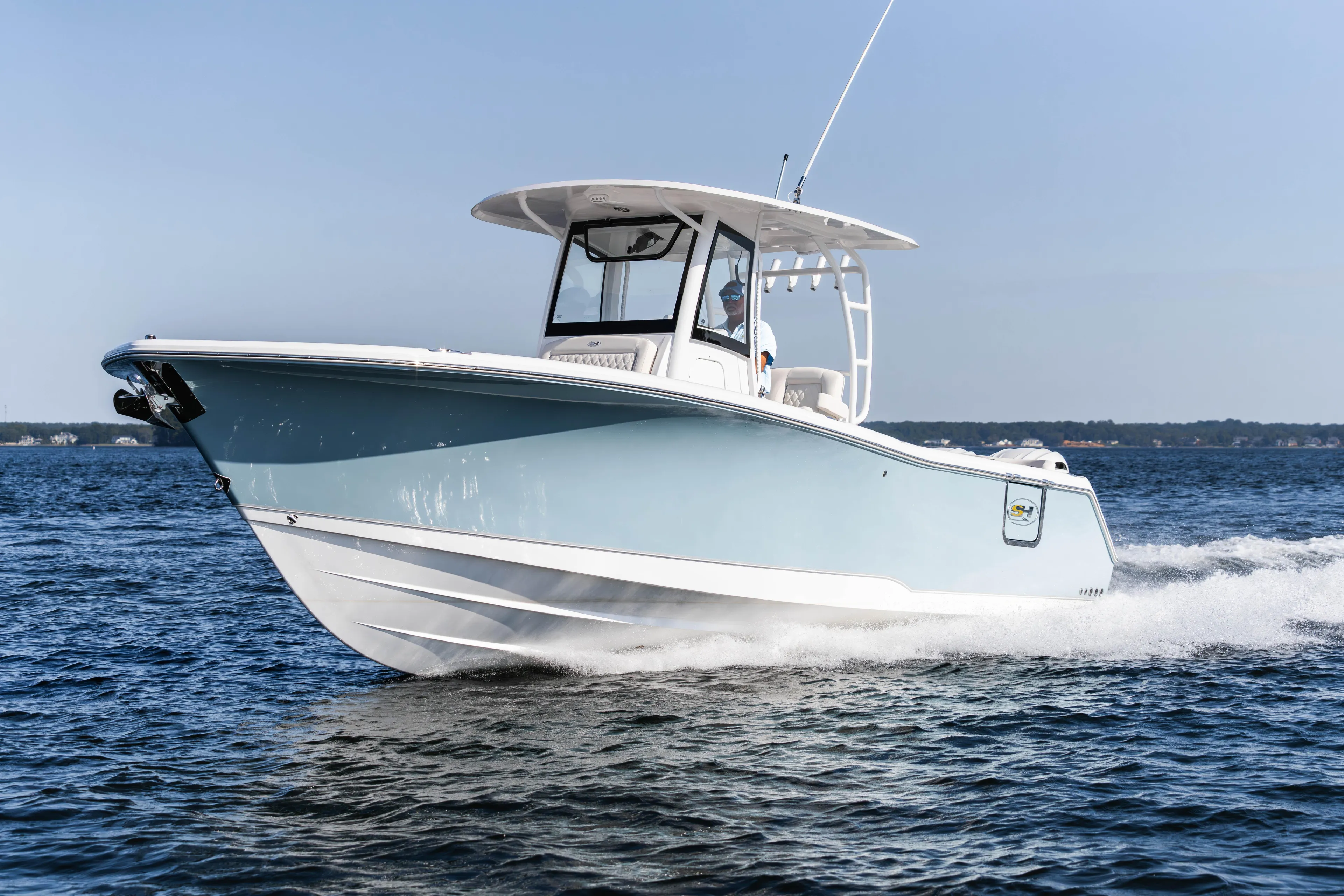  Yacht Photos Pics 2026 Sea Hunt Ultra 285 Coffin Box boat cruising on open water.