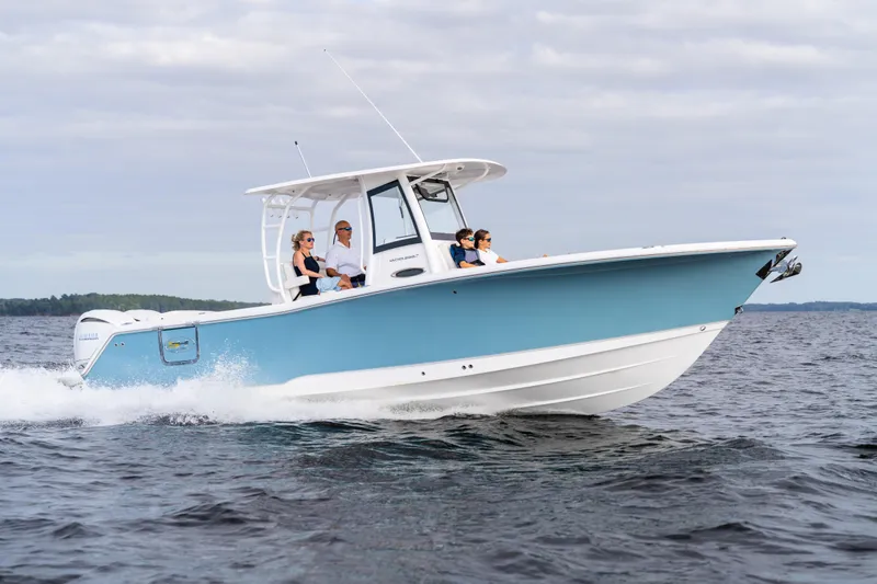  Yacht Photos Pics 2026 Sea Hunt Ultra 285 Coffin Box cruising on open water with passengers.