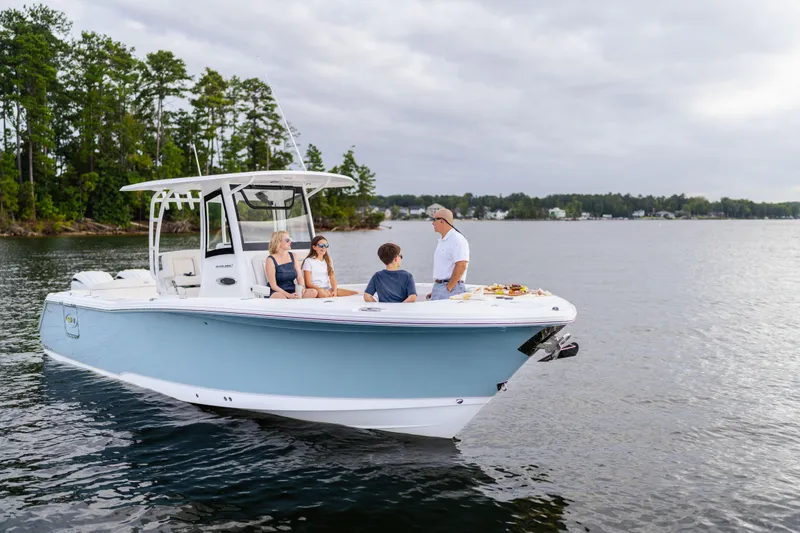  Yacht Photos Pics 2026 Sea Hunt Ultra 285 Coffin Box boat with people enjoying a day on the water.