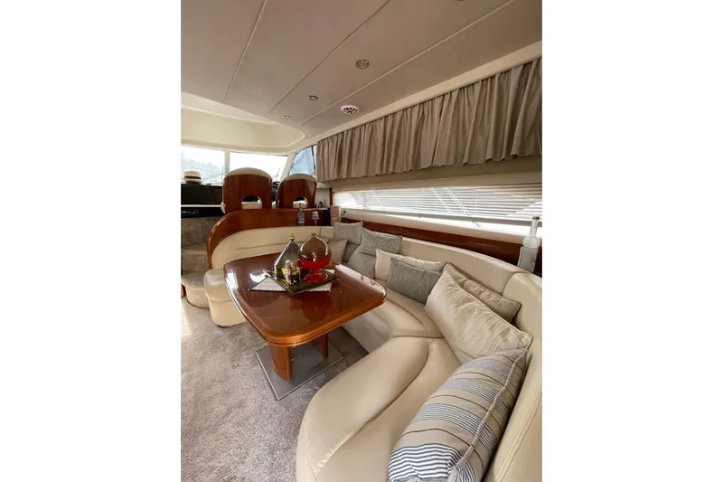  Yacht Photos Pics Luxurious interior of a 2006 Princess 50 yacht with elegant seating and decor.