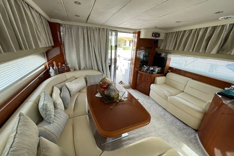  Yacht Photos Pics Luxurious interior of a 2006 Princess 50 yacht with elegant seating and decor.
