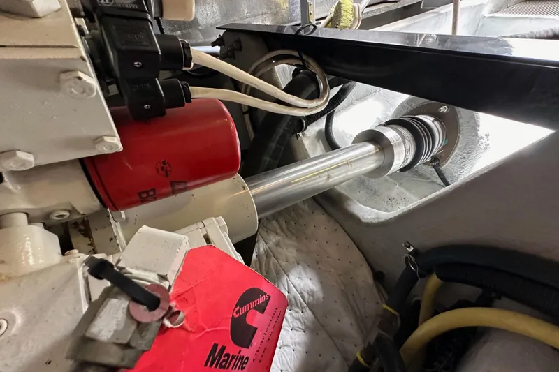 Seas The Day Yacht Photos Pics Engine compartment of 2004 Meridian 580 Pilothouse with Cummins marine components.