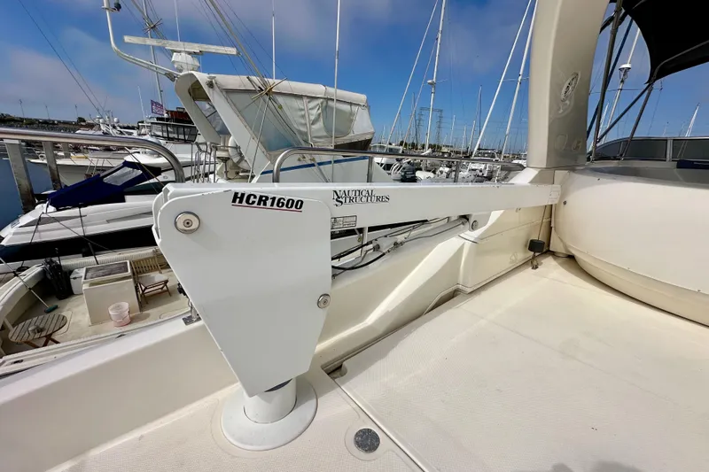 Seas The Day Yacht Photos Pics 2004 Meridian 580 Pilothouse yacht with HCR1600 crane at marina.