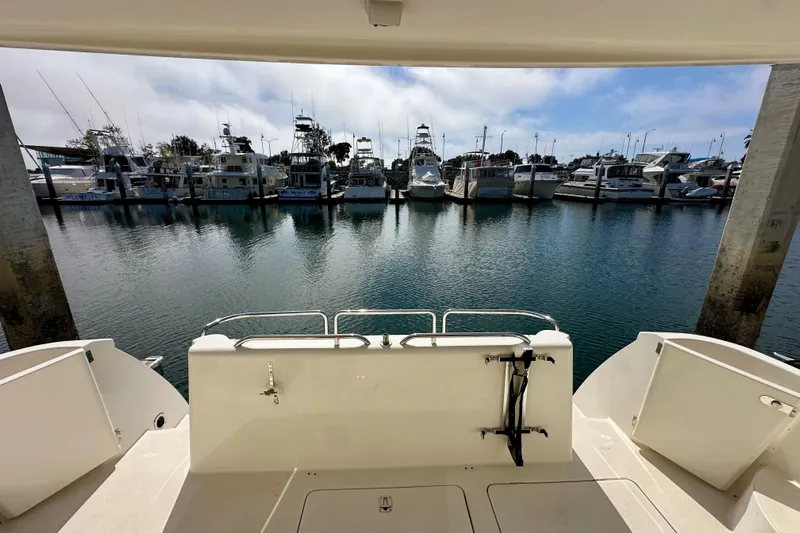 Seas The Day Yacht Photos Pics 2004 Meridian 580 Pilothouse yacht docked at marina with other boats.
