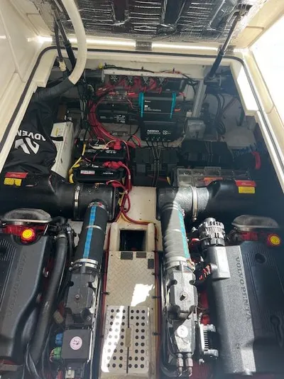 My Jojo Yacht Photos Pics Engine compartment of 2005 Cruisers Yachts 370 Express, showcasing dual Volvo Penta engines.