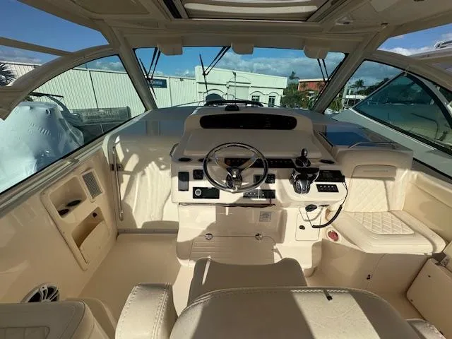  Yacht Photos Pics 2021 Grady-White Express 370 boat interior with modern helm and seating.