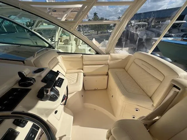  Yacht Photos Pics Luxurious 2021 Grady-White Express 370 boat interior with plush seating and modern controls.