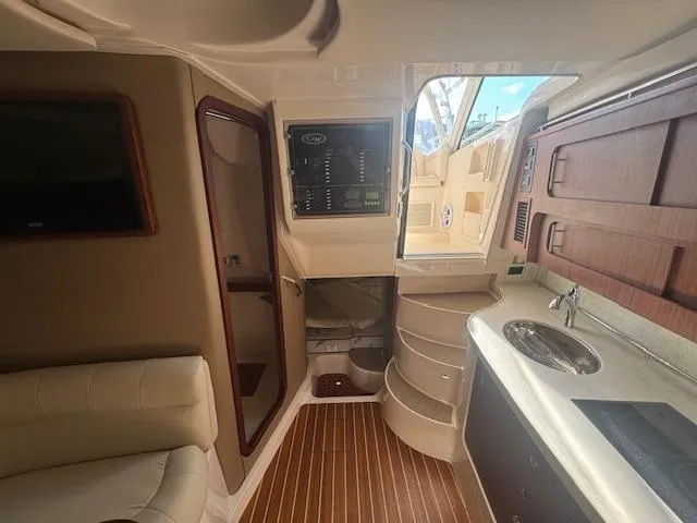  Yacht Photos Pics Interior of 2021 Grady-White Express 370 boat, featuring modern kitchen and seating area.