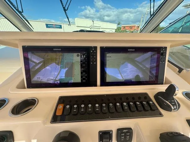  Yacht Photos Pics Grady-White Express 370 helm with dual Simrad displays, 2021 model.