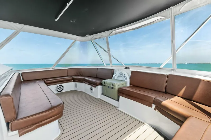 Big Game Yacht Photos Pics Luxurious interior of 2006 Hatteras 68 Convertible yacht with ocean view.