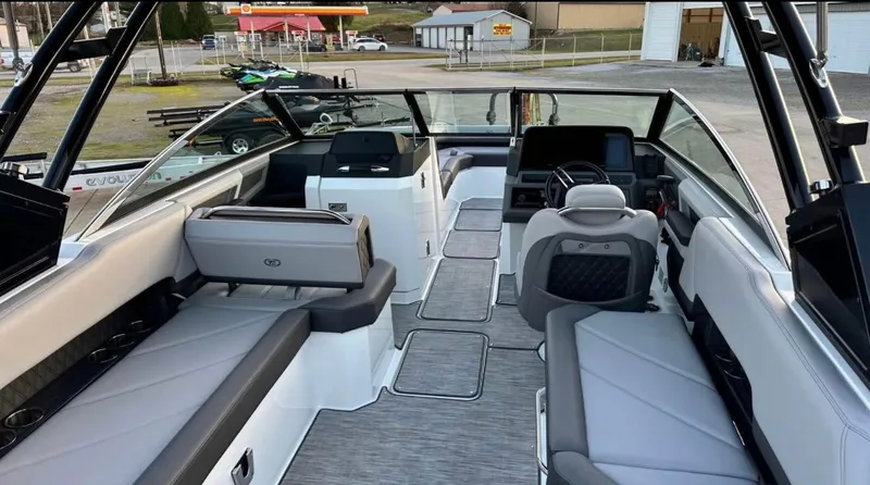  Yacht Photos Pics 2022 Cobalt R8 boat interior with sleek seating and modern dashboard.