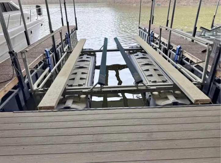  Yacht Photos Pics Boat lift at a dock, designed for a 2022 Cobalt R8.