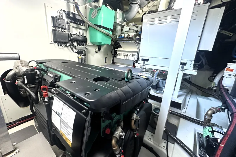 Lady Jane III Yacht Photos Pics Engine room of 2023 Prestige 520 yacht, showcasing advanced machinery and components.