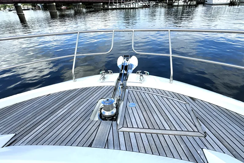 Lady Jane III Yacht Photos Pics Bow of 2023 Prestige 520 yacht with sleek deck and water view.