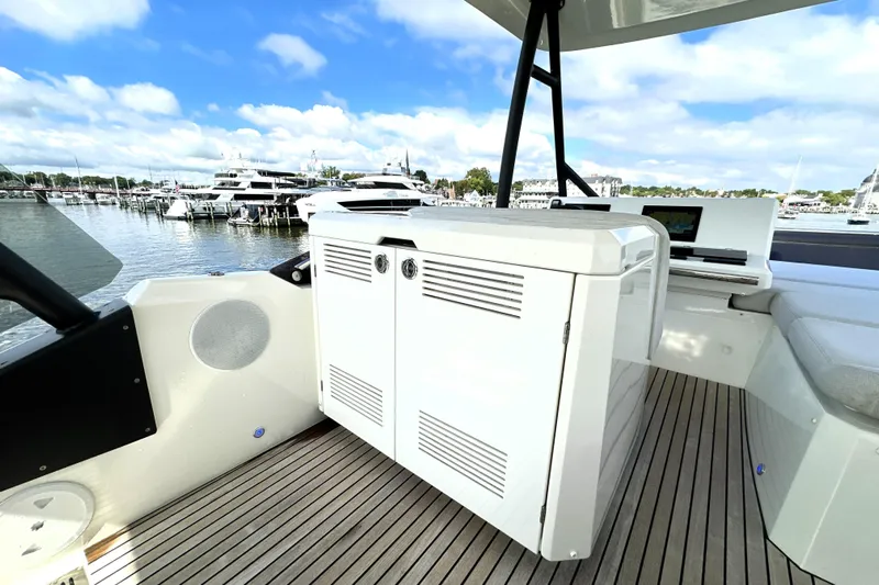 Lady Jane III Yacht Photos Pics Prestige 520 yacht deck with modern amenities, 2023 model, docked at marina.