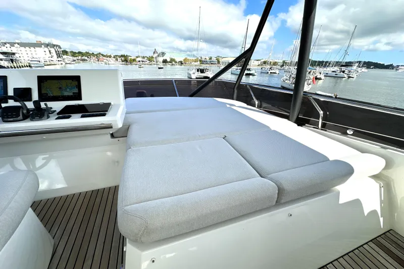 Lady Jane III Yacht Photos Pics Luxurious 2023 Prestige 520 yacht interior with plush seating and modern navigation equipment.