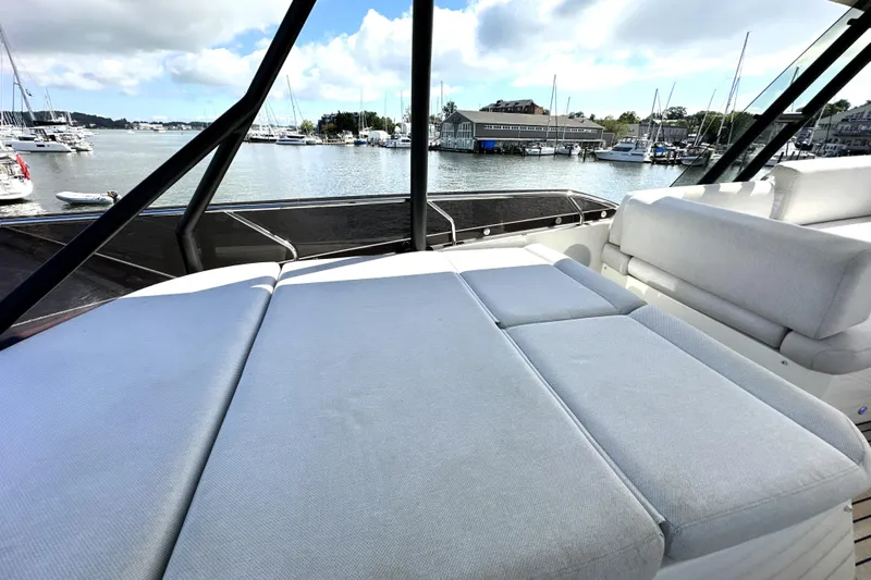 Lady Jane III Yacht Photos Pics Luxurious 2023 Prestige 520 yacht with spacious deck and scenic marina view.