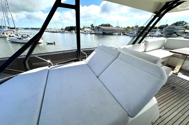 Lady Jane III Yacht Photos Pics Luxurious 2023 Prestige 520 yacht with spacious deck and marina view.
