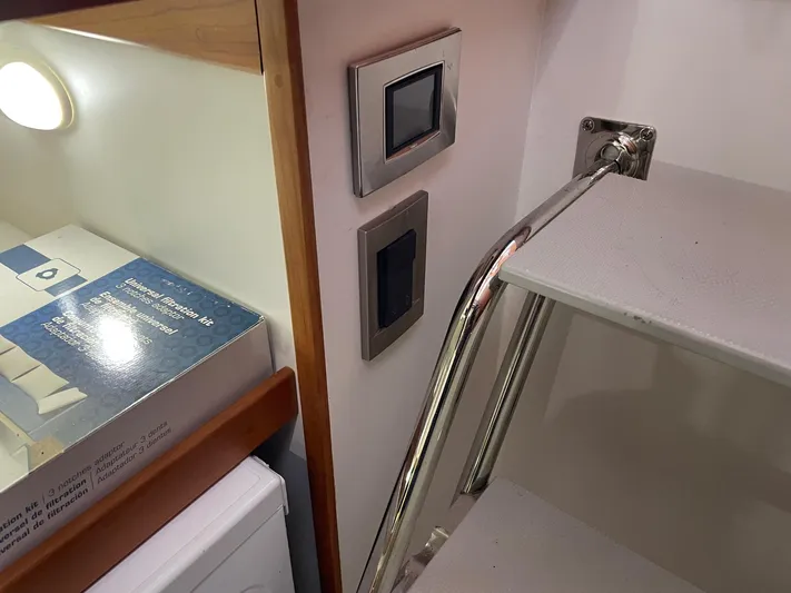 Haggis Xx Yacht Photos Pics Interior of 2017 Sabre 48 Salon Express with stairs and control panel.