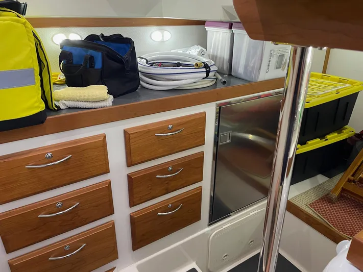 Haggis Xx Yacht Photos Pics Interior of 2017 Sabre 48 Salon Express with storage drawers and equipment.