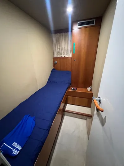 Etan Yacht Photos Pics 2004 Ferretti Yachts 760 cabin with single bed and wooden storage.