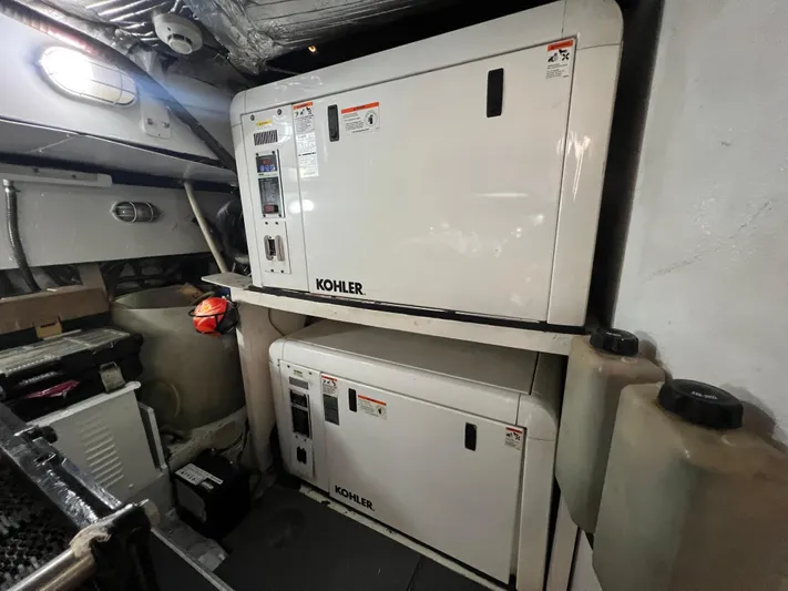 Etan Yacht Photos Pics Engine room of a 2004 Ferretti Yachts 760 with Kohler generators.