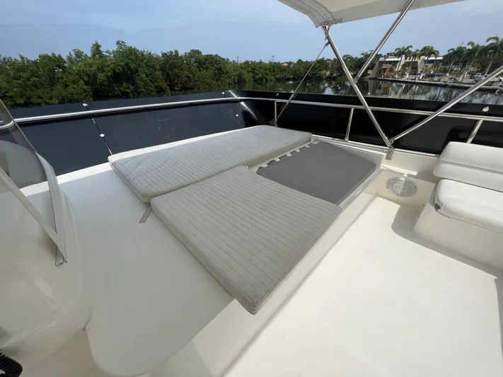 Etan Yacht Photos Pics Sunbathing area on the 2004 Ferretti Yachts 760 with cushioned lounge chairs.