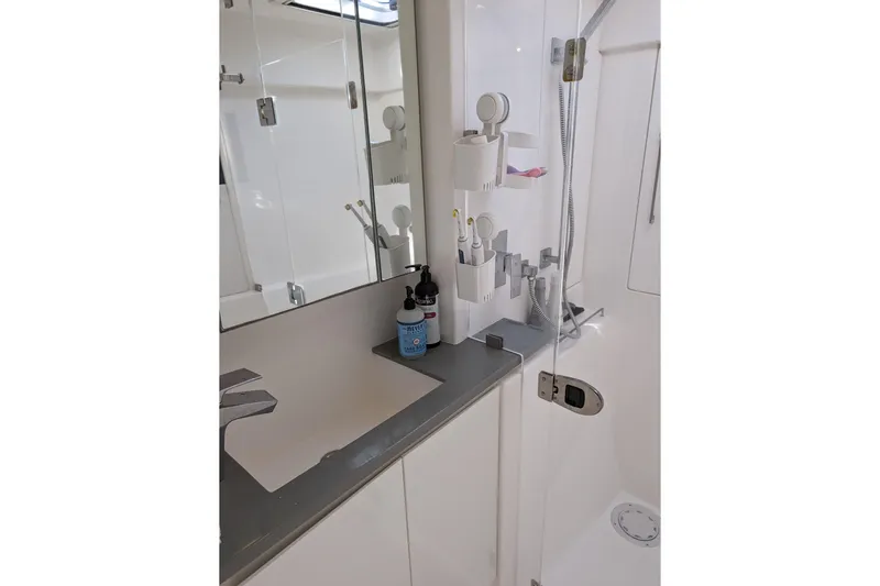 Changing Keys Yacht Photos Pics Modern bathroom in 2020 Leopard 40 yacht with sleek fixtures and storage solutions.