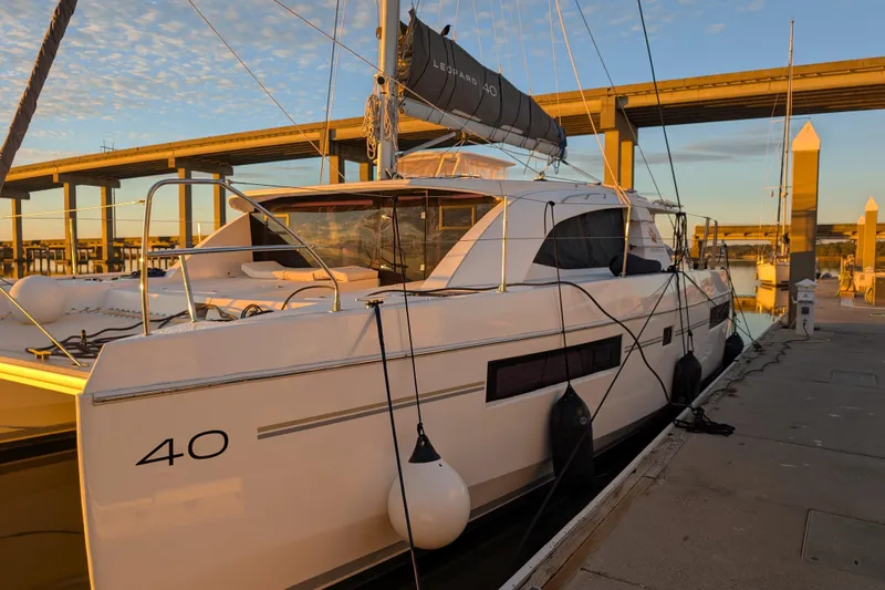 Changing Keys Yacht Photos Pics 2020 Leopard 40 catamaran docked at marina during sunset.