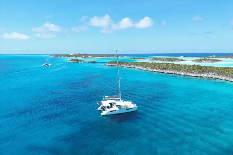 Changing Keys Yacht Photos Pics Catamaran Leopard 40 sailing in clear blue waters near tropical islands, 2020 model.