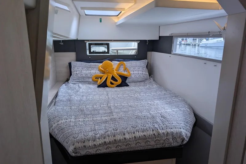 Changing Keys Yacht Photos Pics Cozy bedroom in 2020 Leopard 40 yacht with plush octopus decor.