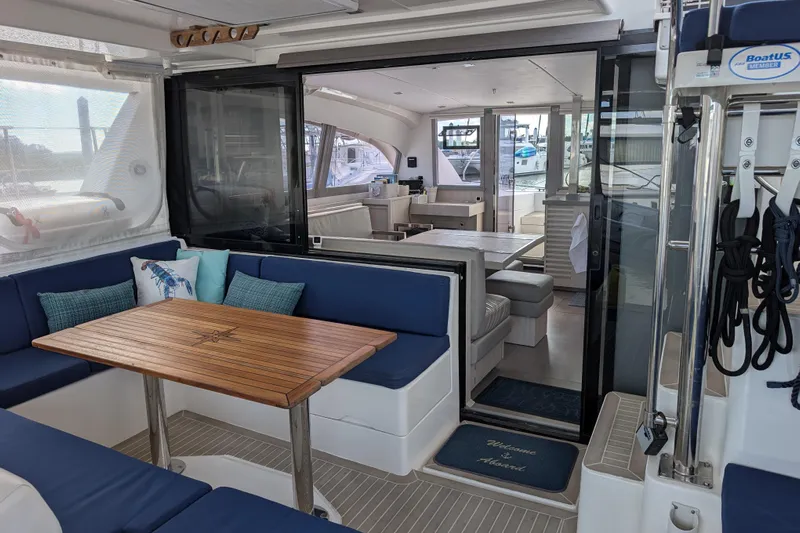 Changing Keys Yacht Photos Pics Luxurious 2020 Leopard 40 yacht interior with elegant seating and dining area.