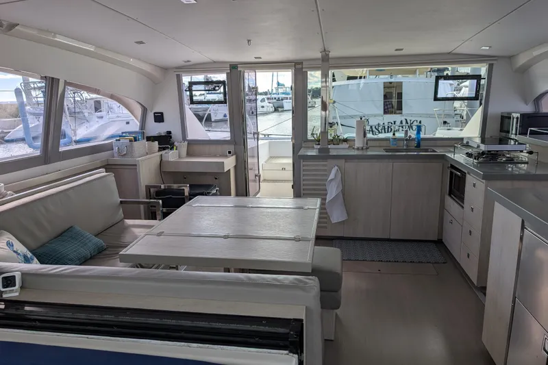 Changing Keys Yacht Photos Pics Interior of a 2020 Leopard 40 catamaran with modern kitchen and seating area.