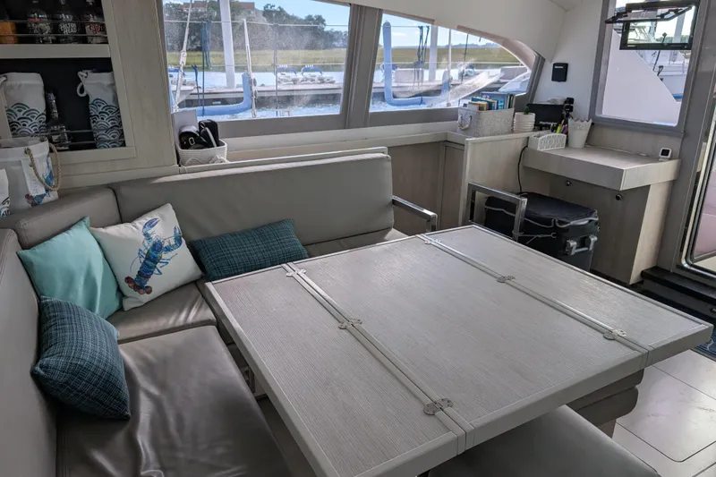 Changing Keys Yacht Photos Pics Interior of a 2020 Leopard 40 catamaran with modern seating and nautical decor.