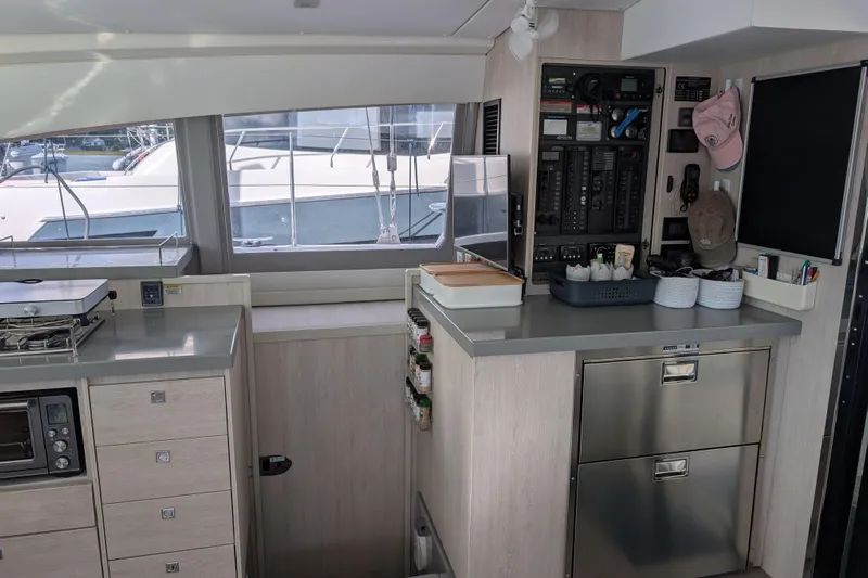 Changing Keys Yacht Photos Pics Modern kitchen interior of 2020 Leopard 40 yacht with appliances and storage.