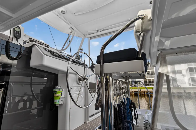 Changing Keys Yacht Photos Pics Helm station of 2020 Leopard 40 catamaran with steering wheel and navigation equipment.