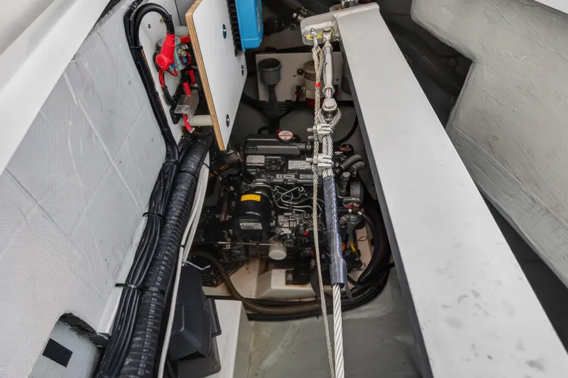 Changing Keys Yacht Photos Pics Engine compartment of a 2020 Leopard 40 catamaran, showcasing wiring and mechanical components.